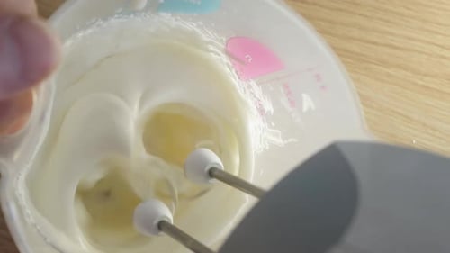 Electric Beater Mixes Sweet White Batter