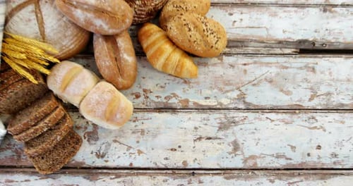 Fresh Bread Still Life on Rustic Wooden Table