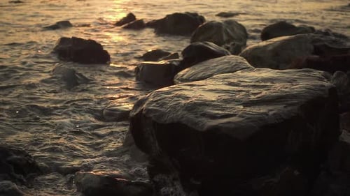 Splash of a Wave on a Rock on the Shore
