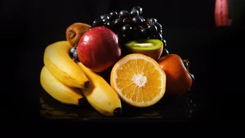 Measuring Tape Falls on Fresh Fruits and Berries