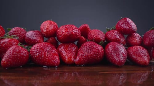 Fresh Strawberries Arranged on a Wooden Table