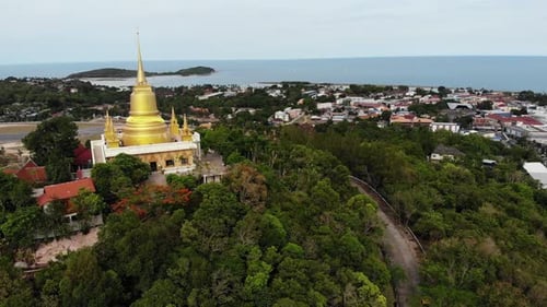 Classic Buddhist Temple Between Forest. From Above Drone View Buddhist Monastery Between Green Trees