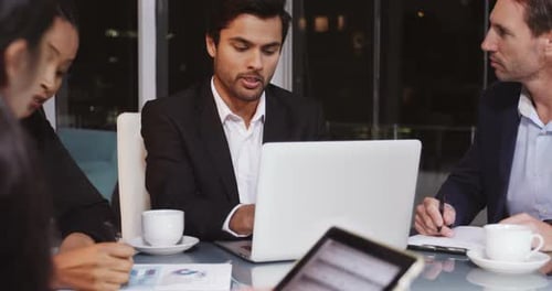Business Team Meeting Late at Night