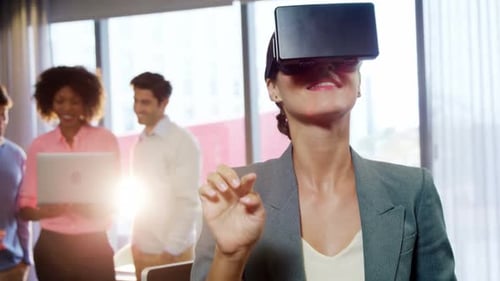 Woman Uses VR Headset in Modern Office