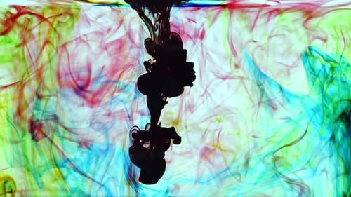 Black Ink Dropped into Vibrant Colorful Ink