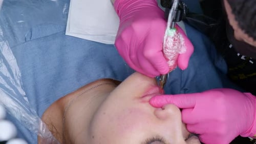 Microblading Lip Tattoo with Special Coloring Pigment That Corrects Lip Color in Cosmetology Clinic