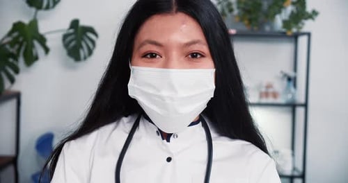 Health Worker in Mask, Lab Coat Close Up