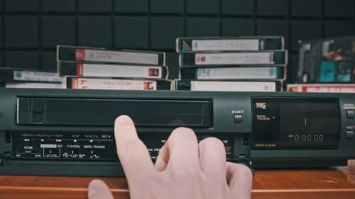 Insert VHS Cassette Into VCR and Push Play Button