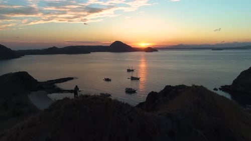 Photographers are shooting in sunrise at Pada Island, Komodo