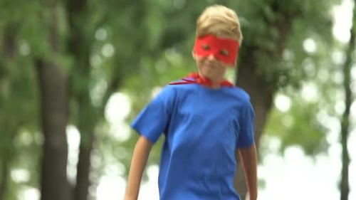 Superhero Boy Playing in Park, Pretending to Fly, Brave Child and Winner Concept