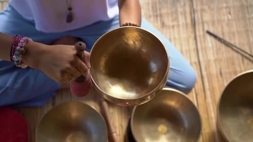 Playing a Singing Bowl for Meditation