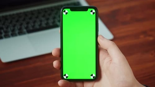 Businessman Using Smartphone with Chroma Key Closeup