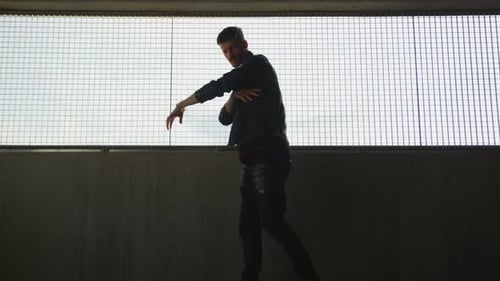 Breaker performing next to a wall
