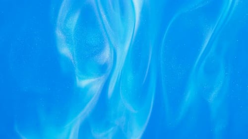Abstract Blue Fluid with Glitter Motion Background