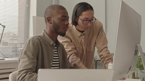 Diverse Programmers Discussing Coding