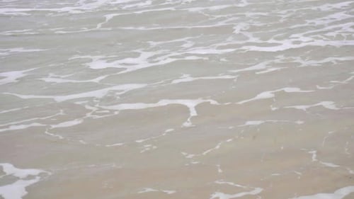Waves on a Sandy Beach
