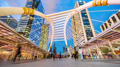 Motion Time lapse of People walking at Chong Nonsi skywalk at night, Bangkok, Thailand