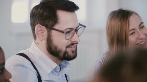 Workplace Team Meeting in Office Setting
