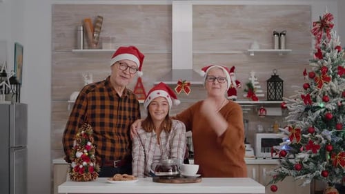 Family Christmas Greetings in Festive Home Kitchen
