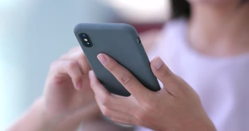 Close up Woman use of mobile phone