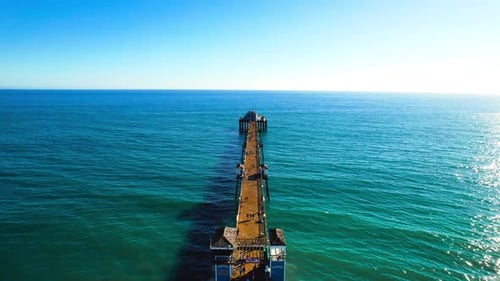 Oceanside pier drone shot over the ocean