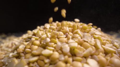 Split Peas Falling onto a Pile
