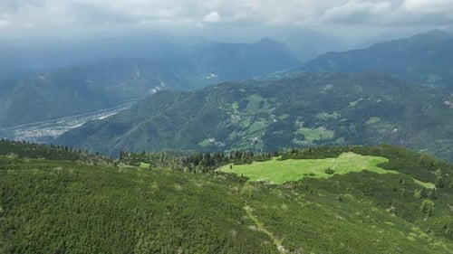 Aerial View of Green Mountains and Hills Landscape