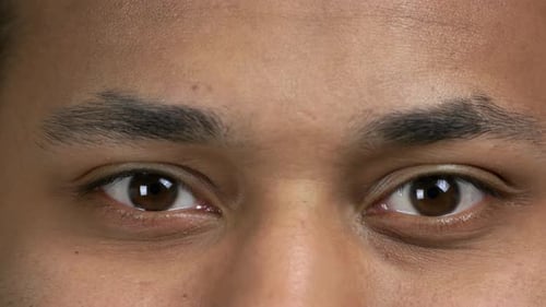 Beautiful Blinking Male Eyes Close Up