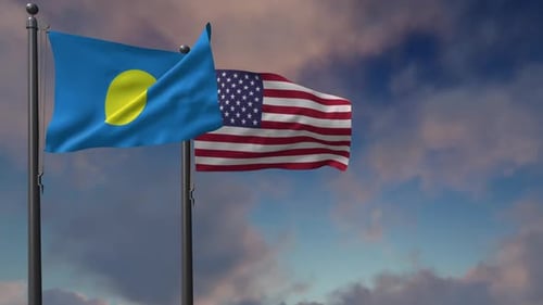 Palau and USA Flags Waving Against Cloudy Sky