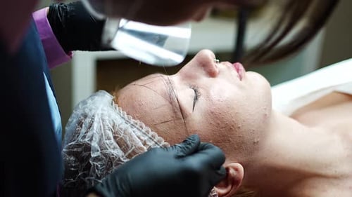 Eyebrow Shaping Procedure in Beauty Treatment Clinic