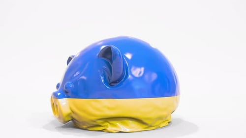 Deflating Piggy Bank with Printed Flag of Ukraine