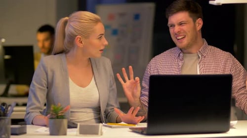 Business Team Making High Five at Night Office