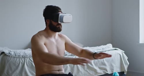 Man Immersed in Virtual Reality at Home
