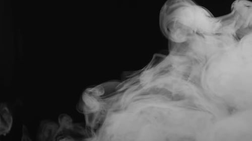 Elegant White Smoke Drifting on Black Background