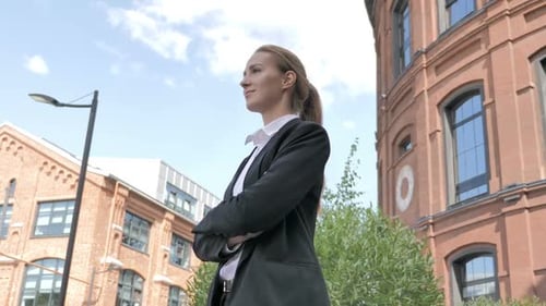 Businesswoman Standing Outside Office
