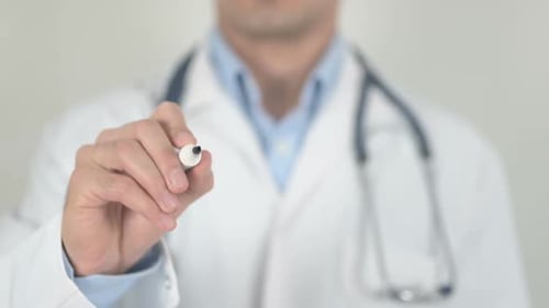 Doctor Writes 'Breathe' with Marker