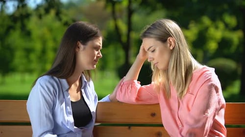 Girl Supporting and Comforting Her Best Friend Stroking Her Shoulder, Depression