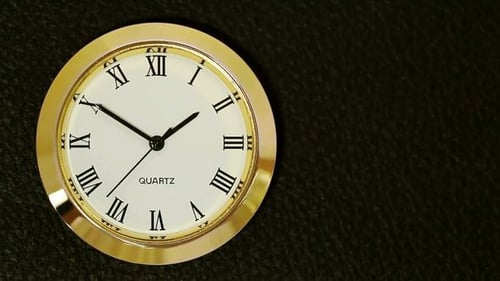 Montre avec chiffres romains (gauche)