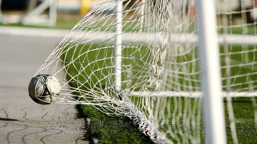 Close View of White Soccer Goal on Turf