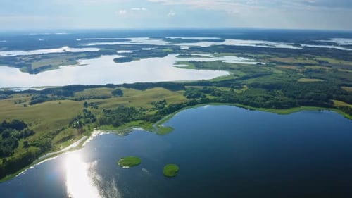 Aerial View Amazing Lake Land with Picturesque Islands Covered with Green Trees and Meadows in