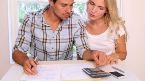 Stressed Young Paying Their Bills Together