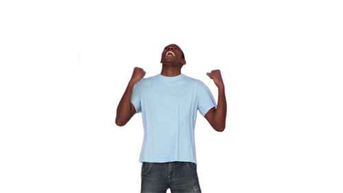 Young Man Celebrates Success on White Background