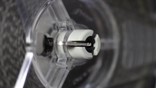 Close Up of a Small Plastic Machine Device