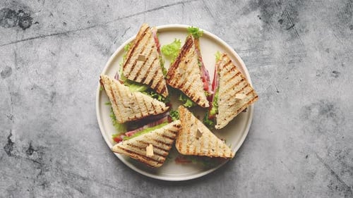 Appetizing Fresh and Healthy Grilled Club Sandwiches with Ham and Cheese