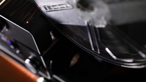 Record Player Platter Turning in Dim Home Lighting