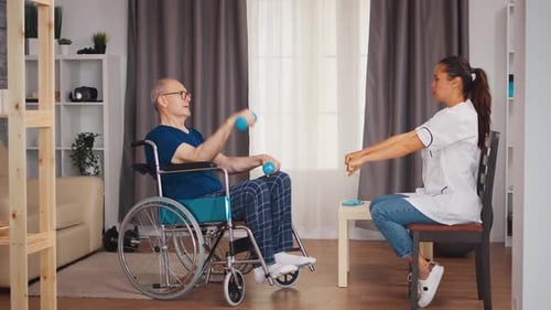 Senior Man Exercising with Therapist in Bright Home