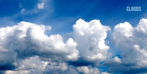 Fluffy Clouds Floating across the Blue Sky