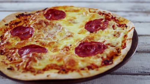 Pepperoni Pizza with Melted Cheese Overhead