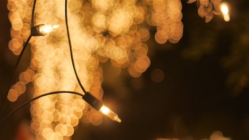 Bokeh of Warm Golden Christmas Lights at Night