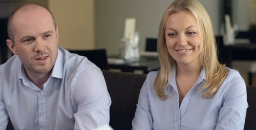 Business People Discussing Contract Indoors